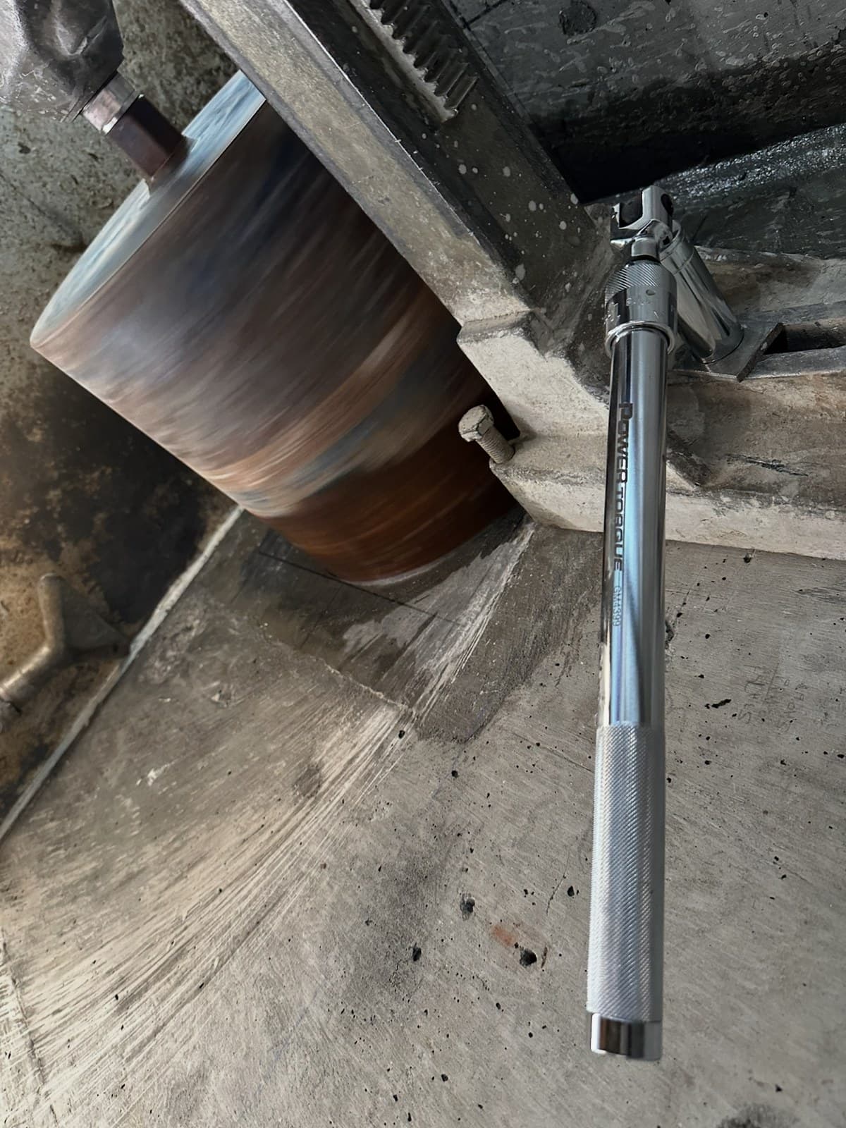 Concrete core sample and drill barrel after extraction