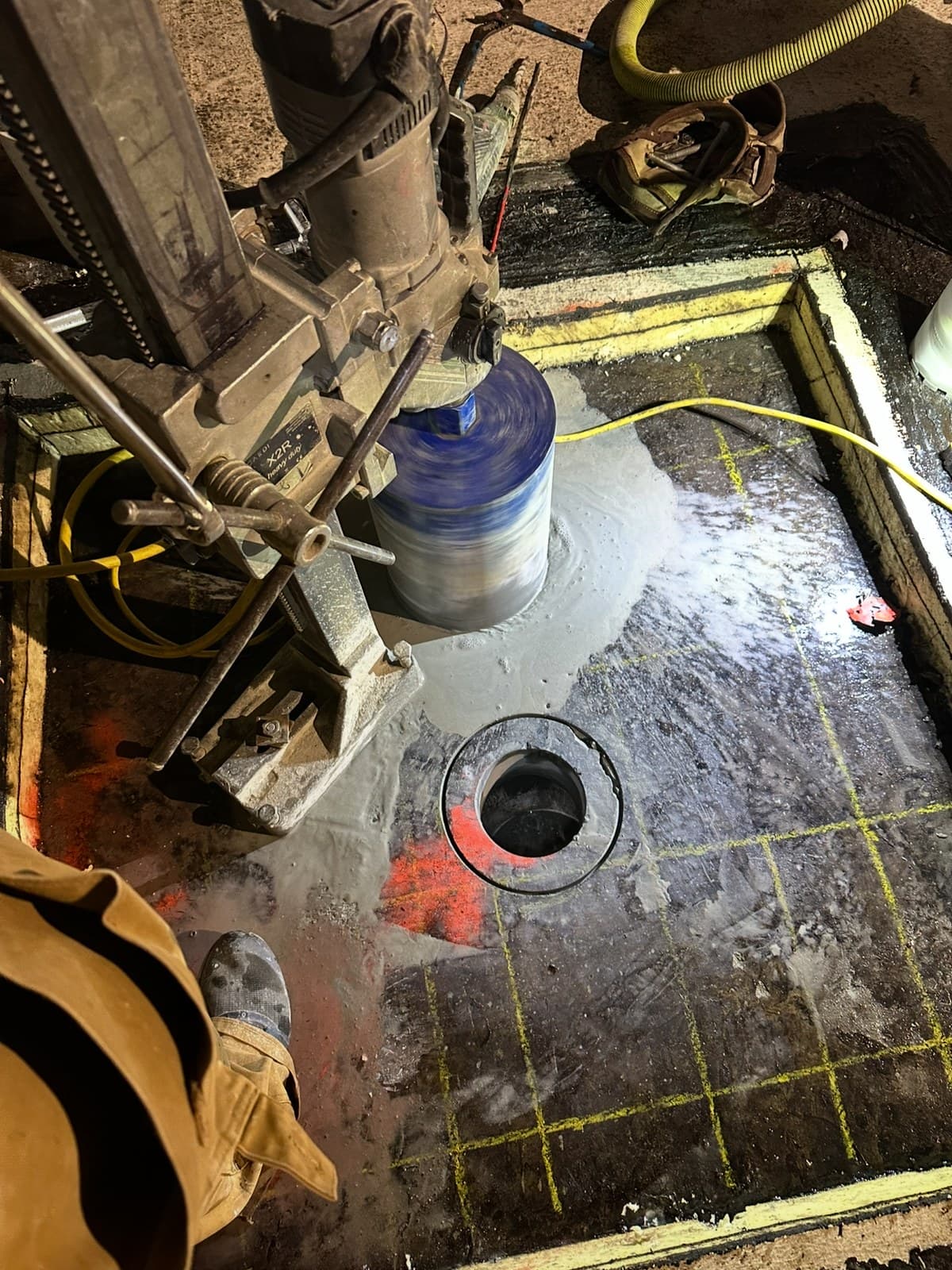 Core drilling through reinforced concrete floor slab